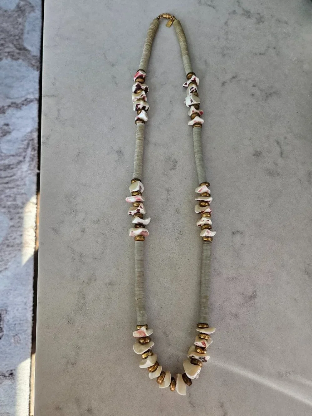 RARE AND VINTAGE KENNETH LANE PUKA / HEISHA SHELL NECKLACE WITH SHELL FRAGMENTS